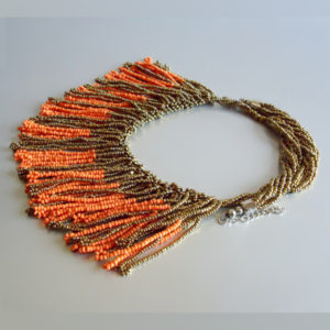 Orange Tasselled Bib