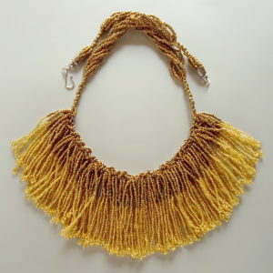 Gold Tasselled Bib - HMJServices